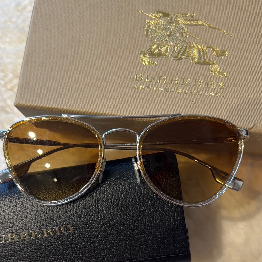 Burberry Gold Aviator Sunglasses with Mirrored Lenses and Sparkle Rims.